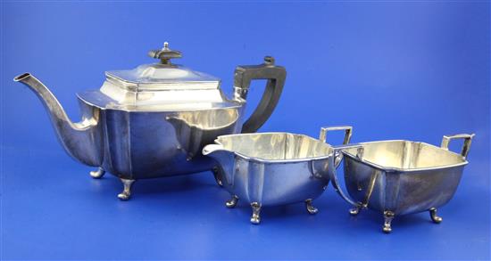 A George VI silver three piece tea set, gross 42 oz.